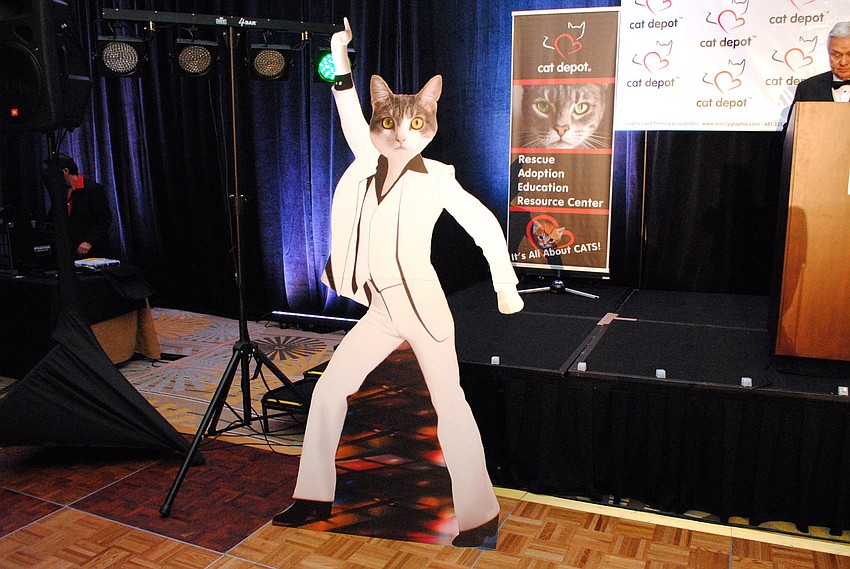 Disco cat cutouts at Caturday Night Fever