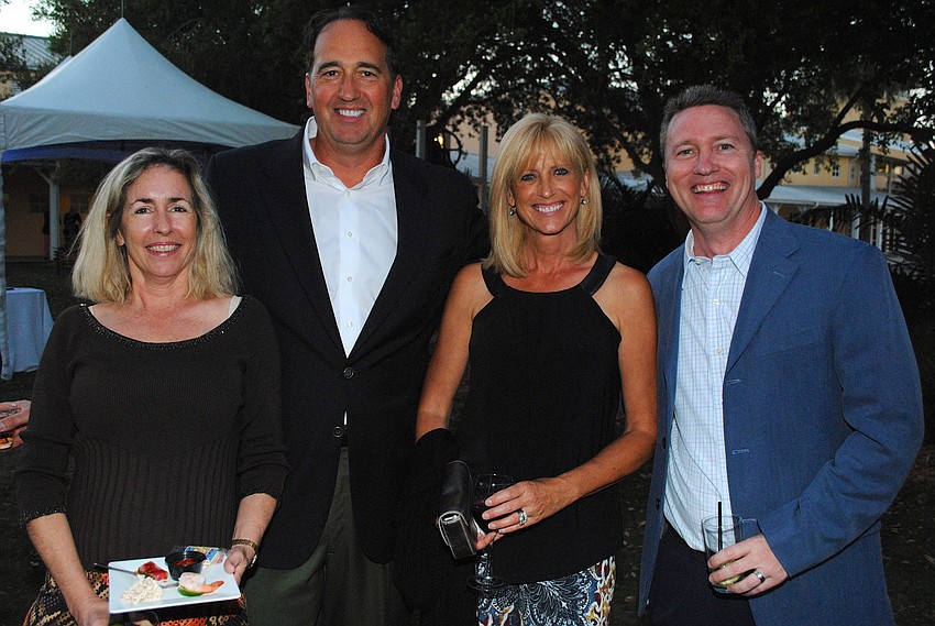 Rhonda Deems, Adam and Suzanne Armbruster with Dennis Chapman