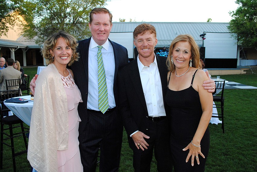 Stephanie and Eric Miller with Todd and Chris Martin