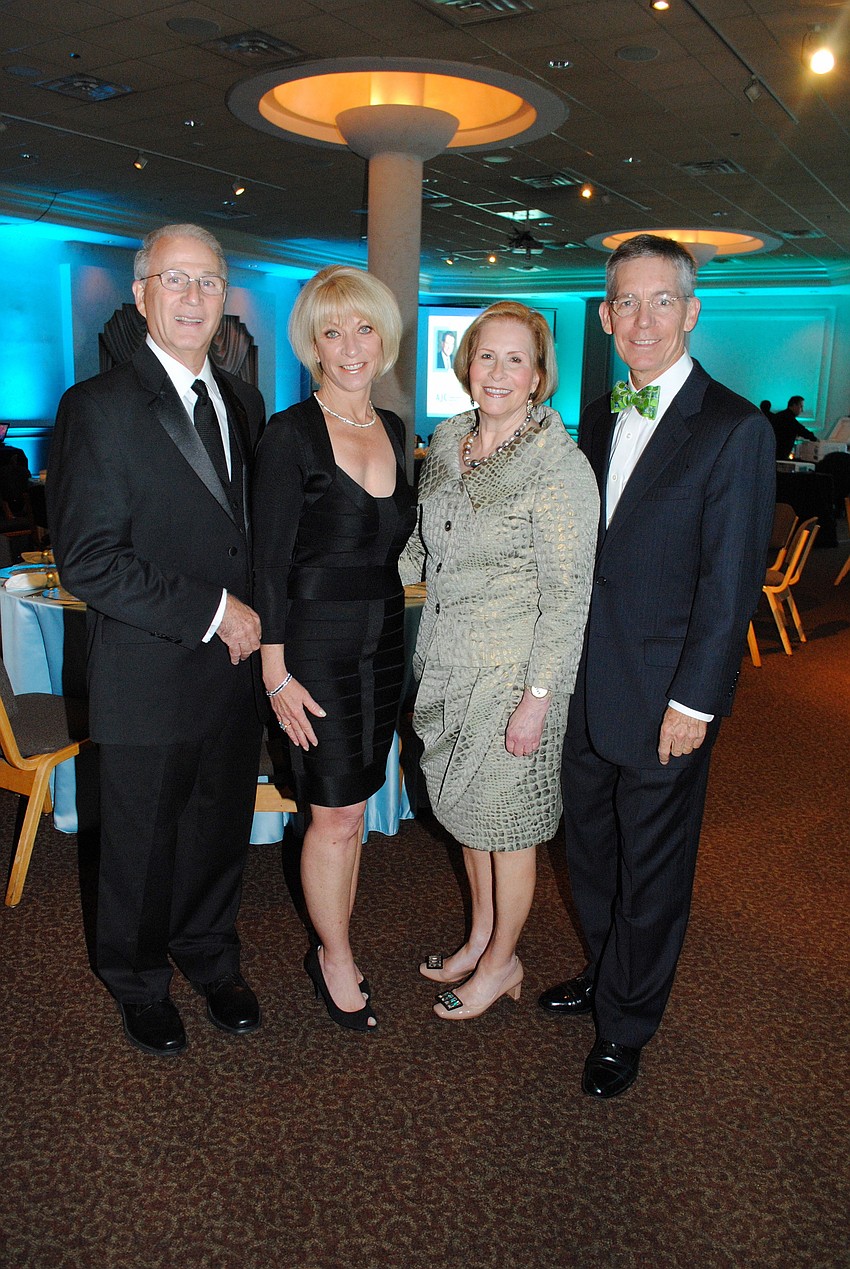 Co-Chairs Larry and Debbie Haspel and Lisa and Matt Walsh