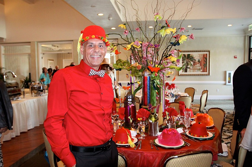 Ron Giarruso poses with his festive table.