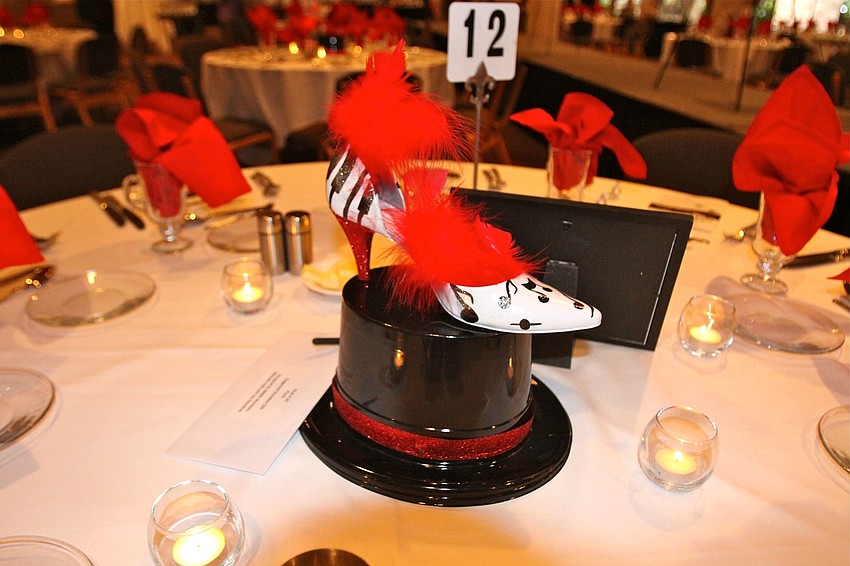 Shoe No. 29 â€œPianoâ€ was the centerpiece at table 12 and was designed by ABWA members Michelle Held and Lisa Donahue.