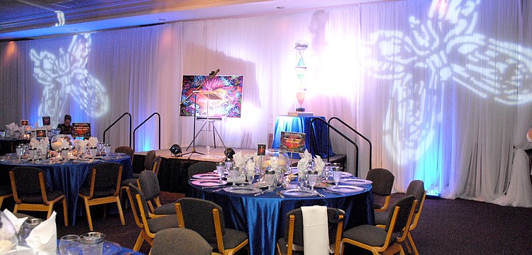 Guests gathered for Child Protection Centerâ€™s second annual Blue Ties and Butterflies fundraising event Wednesday, April 9, at Michaelâ€™s On East.