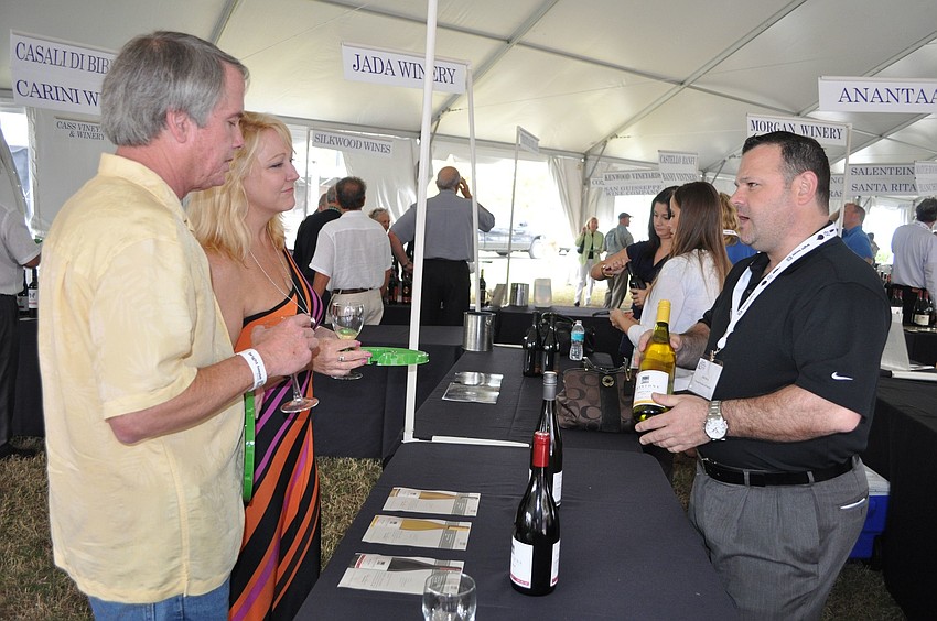 David and Cindy Black chat with winemaker Eric Ruiz.