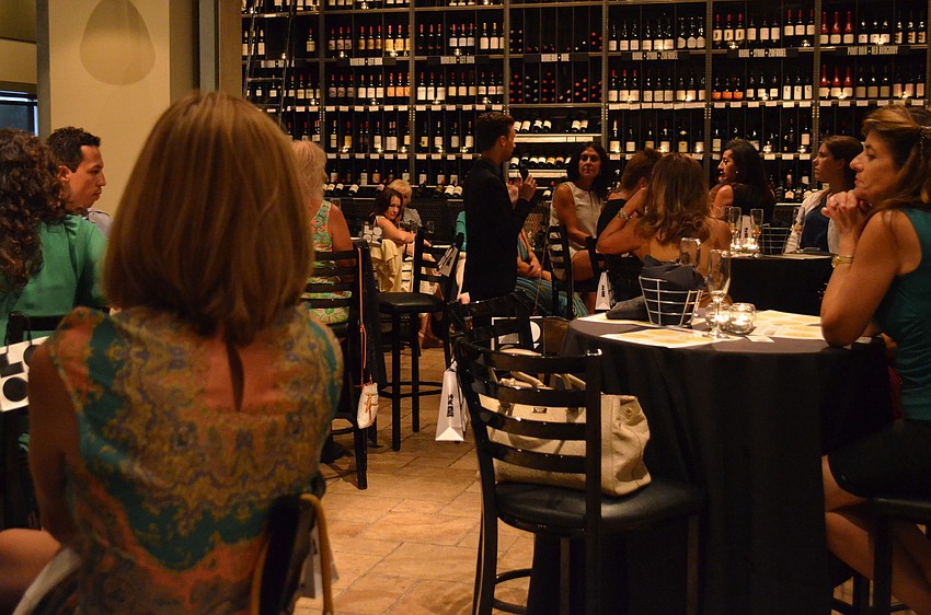 Saks Fifth Avenue Shoe Manager Tyler West spoke to the guests about Jimmy Chooâ€™s.