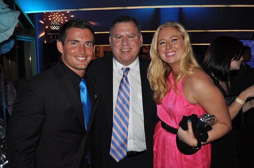 Garrett Brown, Moises Grayson and Jill Grayson