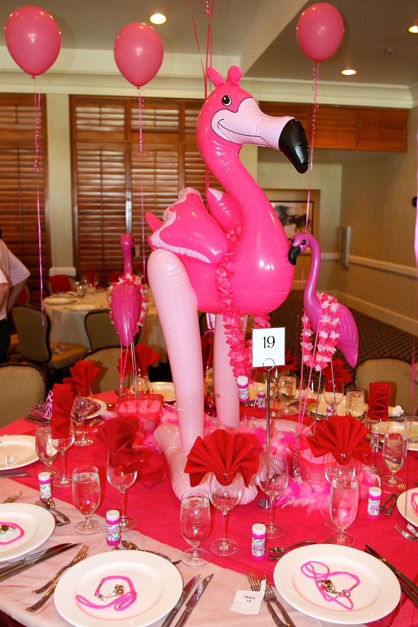 Table 19 was decked out in pink with plenty of pink balloons, flamingos and accessories.