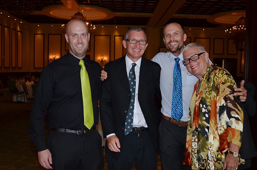 Jordan Heller, Michael Martin, Ryan Mohr and Reverend Karen Wolfson