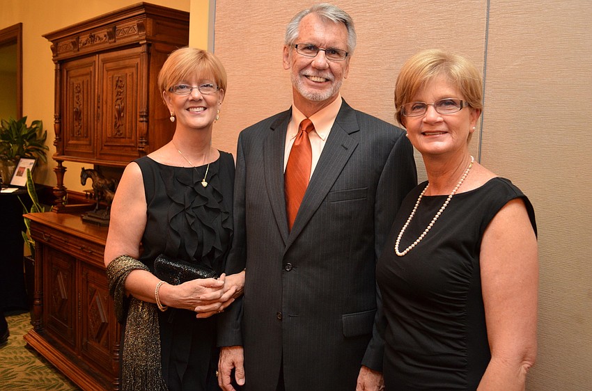 Sarah and Clayton Robertson with Becky Fenton