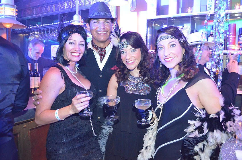 Tara Cocco, Jenny Guerra with Santa and Laura DeOliveria