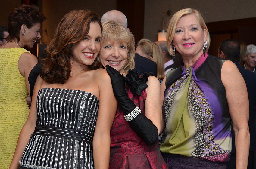 Co-chair Jennie Famiglio, event coordinator Charlie Ann Syprett and co-chair Deborah Blue