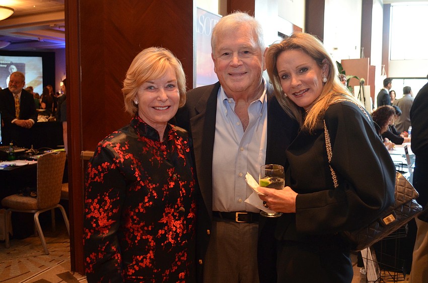 Jennifer and Larry Saslaw with Kim Githler