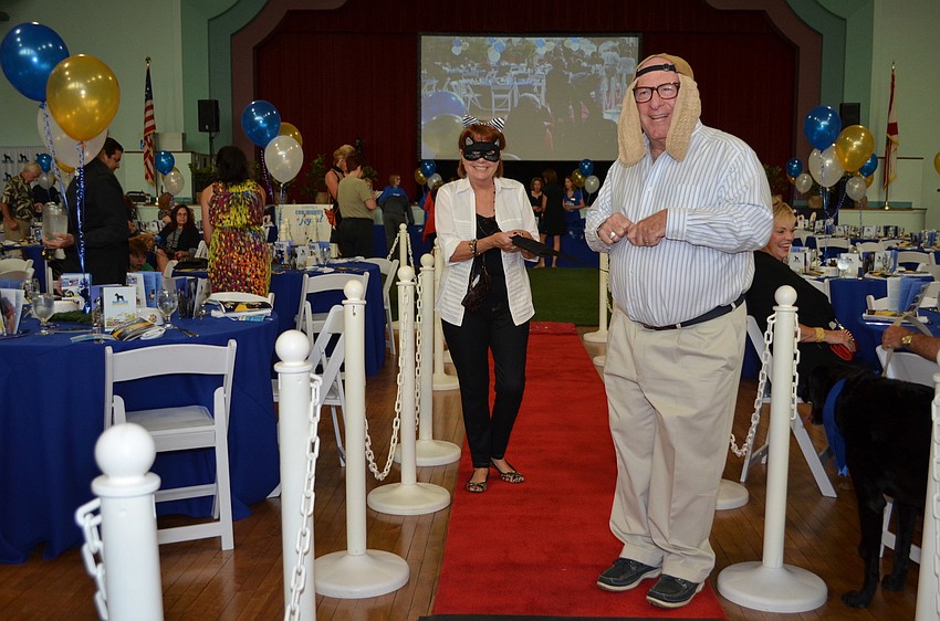 Jo and Al Goldis having some fun at Donteâ€™s Den Top Dog.