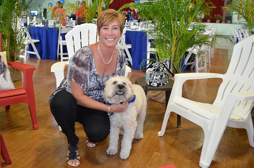 Lisa Holloway with Zoe, the Wheaten Terrier.