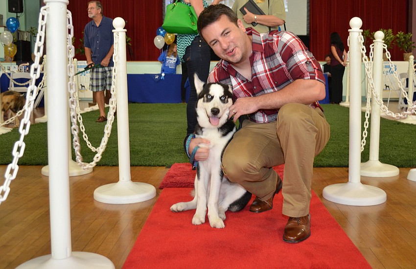 Maverick the husky with Tyler Parisi.