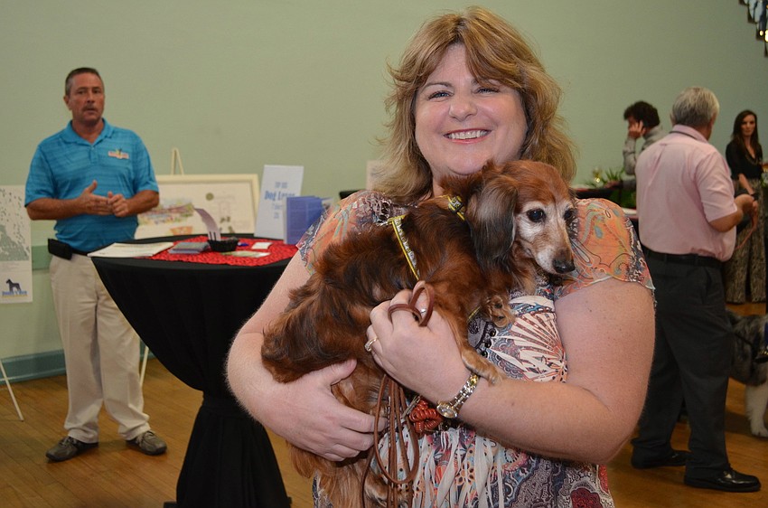 Debbie Perez with Brandy, a longhaired dachshund.