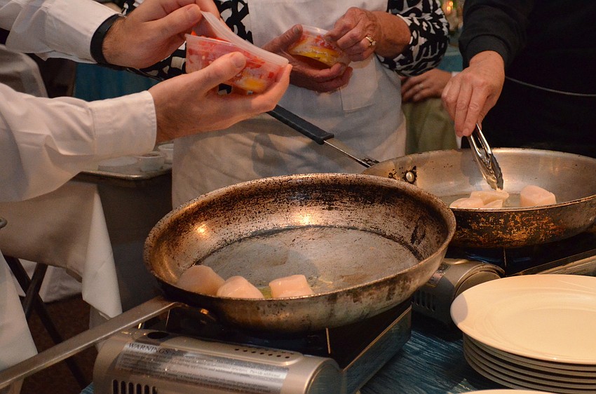 Scallops were made for the second course of the dinner.