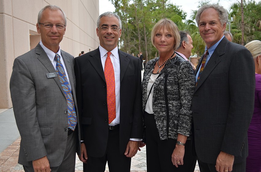 Steven High and Peter Weishar with Kathy and Michael Bush