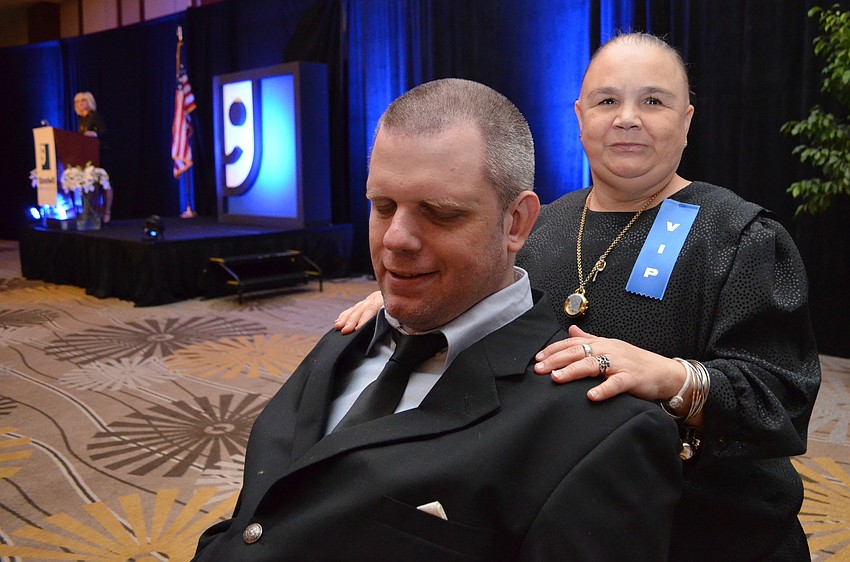 Josh Burch with Goodwill Manasota Employee of the Year Margaretann Villani