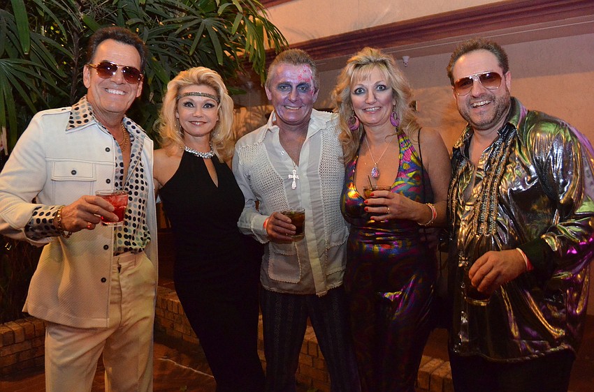 Meir and Steffanie Joanides with Gregory and Andrea Grodoski and Chris Martin