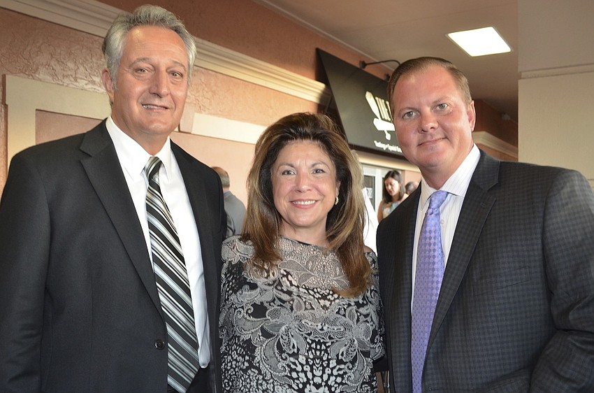 Roberto and Denise Mei with Michael Gibson