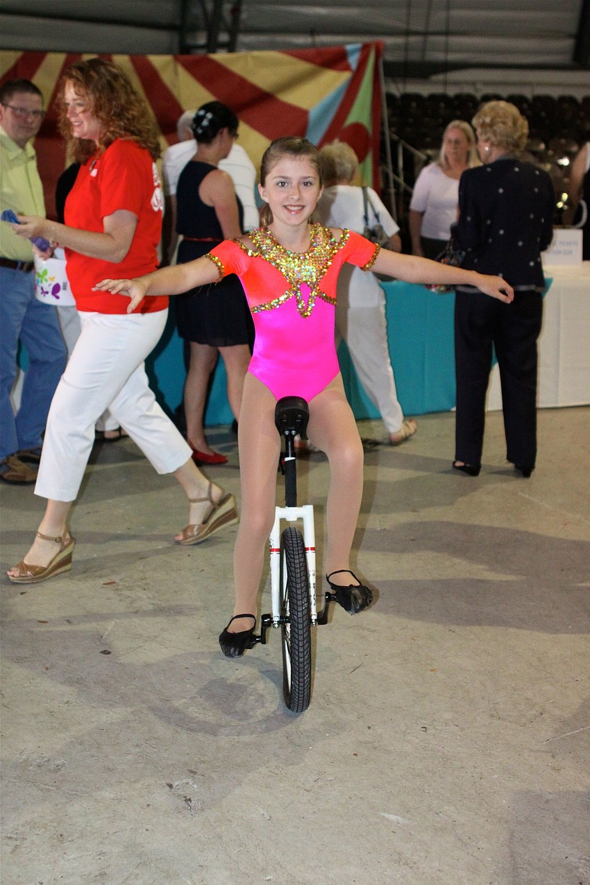 Morgan Campbell, 11, shows off her unicycling skills.