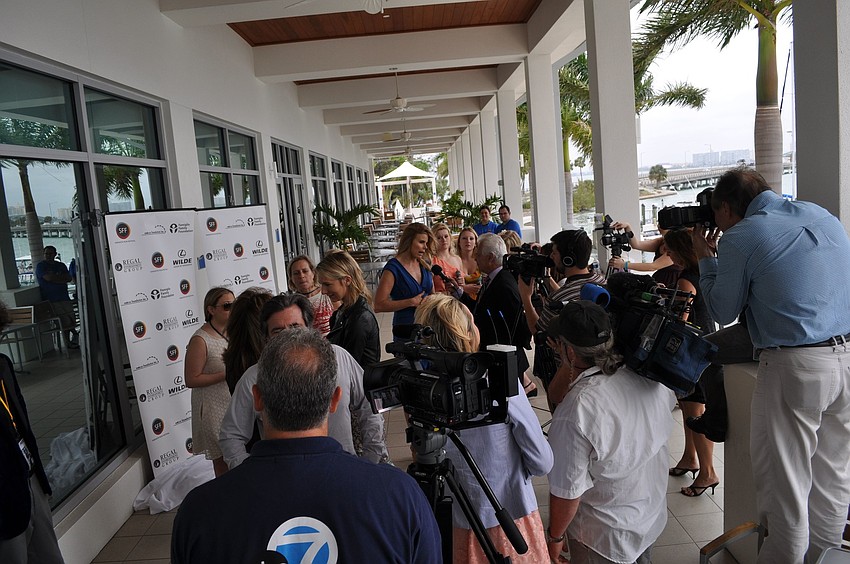 Photographers, videographers and reporters talked with the stars being honored at the Tribute Luncheon at Sarasota Yacht Club.