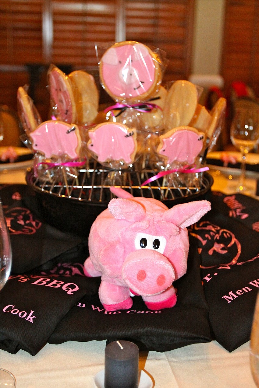 Dr. Bob Vukovichâ€™s table featured pigs since he was doing barbeque for his dish.