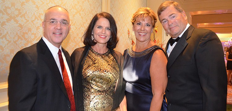 Larry and Sheri Ellis with Cari Fallen and Howard Akey