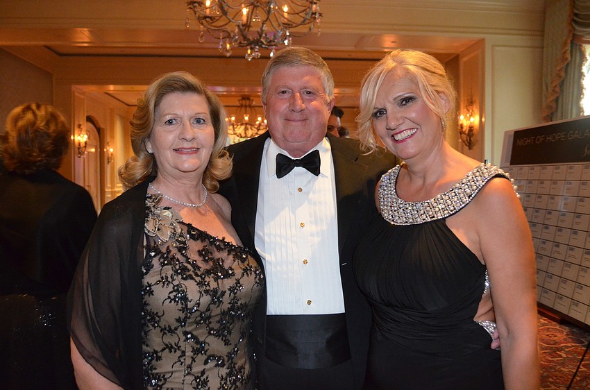 Patricia and Ross Quiggley with Carol Ritter