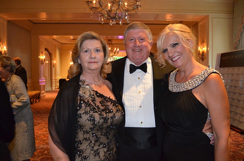 Patricia and Ross Quiggley with Carol Ritter