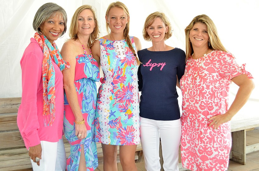 Daisy Saunders, Leslie Daoust, Madeline Jones, Keely Crosby and Jan Sutter model Lilly Pulitzer in the Flip Flops Fashion Show.