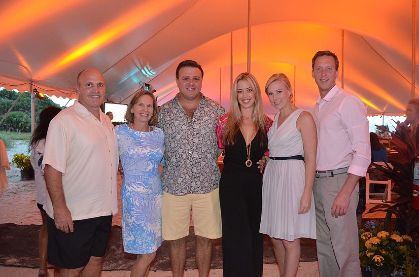 Co-chairs Janae and Jeff Bell, Tom and Kristy Cail and Stephanie and Max Hannum