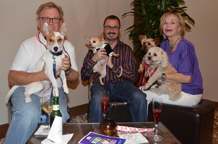 Bob Solgot with Blue, Lee DeLieto with Dessi and Karen Ray with Mickey and Ginger