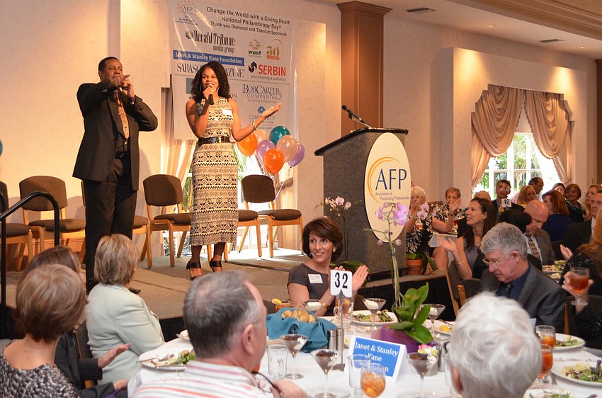 Performers from the Artist Series Concert performed â€˜We Are Family,â€™ and changed some of the lyrics to say â€˜itâ€™s all about philanthropyâ€™ for AFPâ€™s National Philanthropy Day Luncheon.