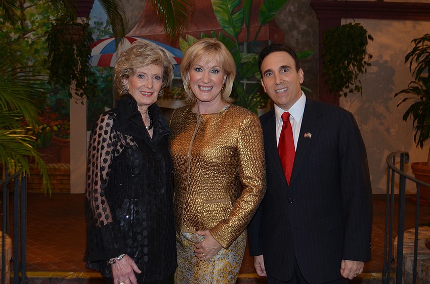 Anne Virag, honoree Teri Hansen and Brian Lipton