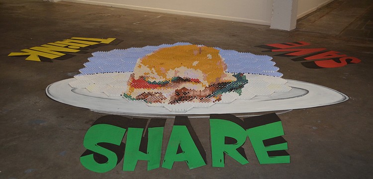 A three-dimensional installation on the floor at the Re-Imagining Sarasota Chalk Artists Art Show