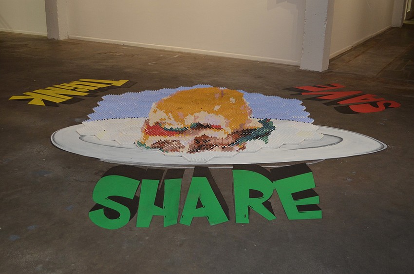 A three-dimensional installation on the floor at the Re-Imagining Sarasota Chalk Artists Art Show