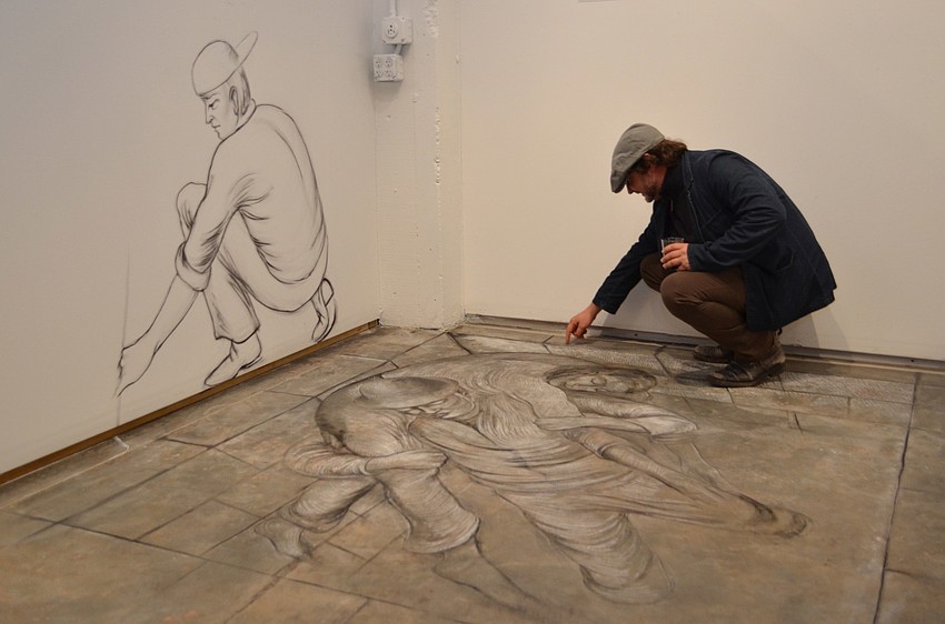 Artist Gary Palmer in front of his installation â€˜On the soldiers shoulders: The cost of freedom fails.â€™