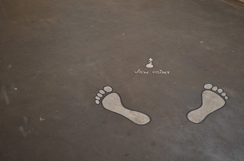 â€œView Pointâ€ footprints were placed on the floor in the location that the artists intended their work to be viewed from.
