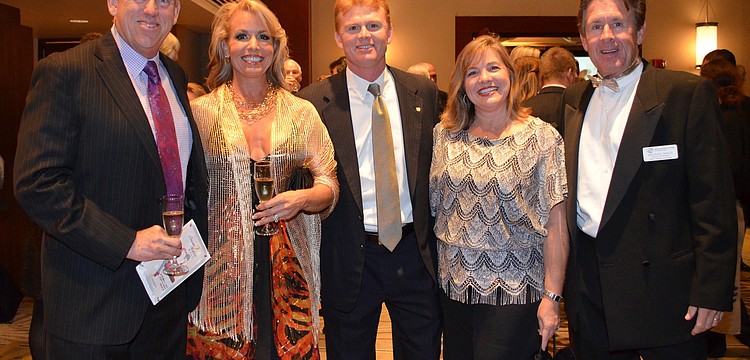 Charlie and Theresa Bartlett, Charles and Susan Hines and Mike Doyle