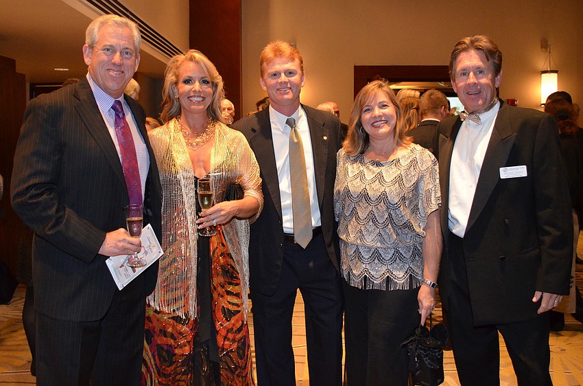 Charlie and Theresa Bartlett, Charles and Susan Hines and Mike Doyle