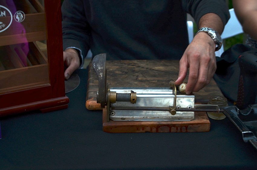 Handmade Cuban Crafters offered hand-rolled cigars to guests at Havana Nights and White Lights.