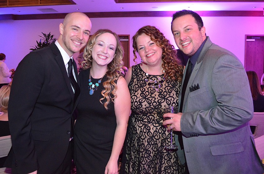 Stephen Ross and Melody Farrell with Darah and Cory Wommert