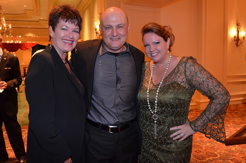 Katherine and Sarp Kaya with Veronica Miller