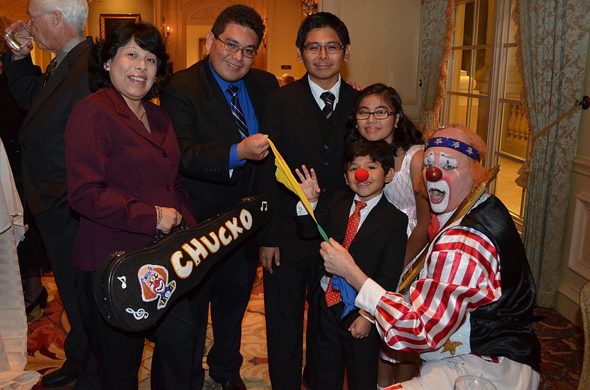 Yolando Melgarejo with Manuel, Miquel, Max and Melody Ramos and Chuck Sidlow