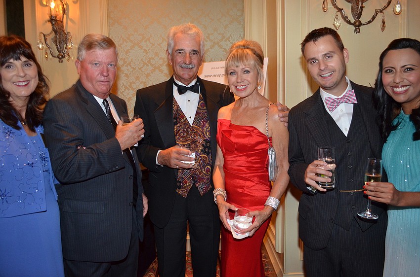 Susan and Brad Schuchat, Greg and Diane Brune, Michael Schuchat and Veronica Hernandez