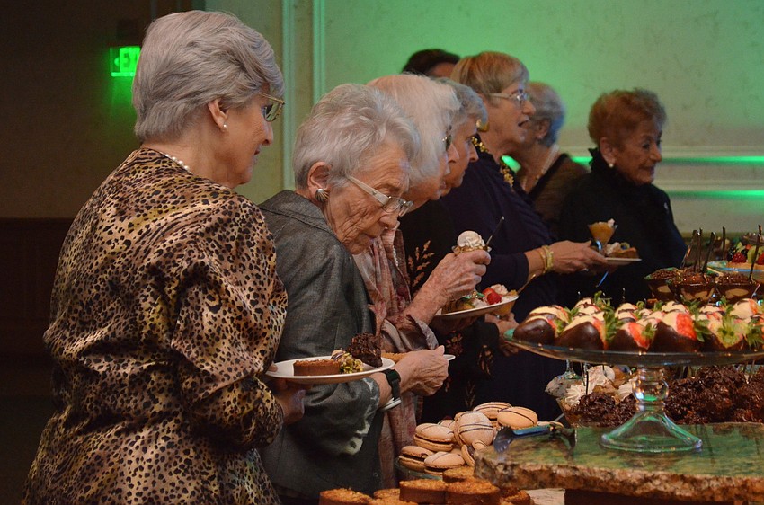 Guests at Keeping the Dream Alive enjoy the dessert buffet.