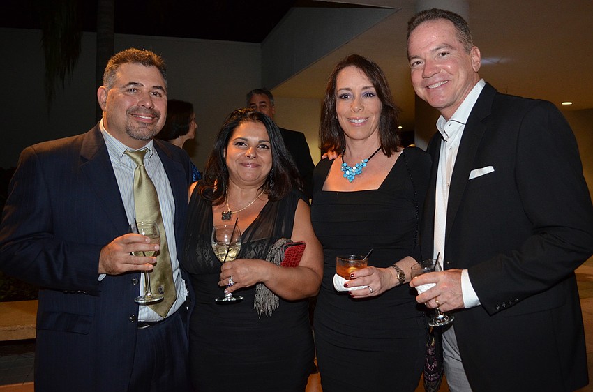 Dr. Robert and Parvaneh Indelicato with Jill and Jeff Brannan