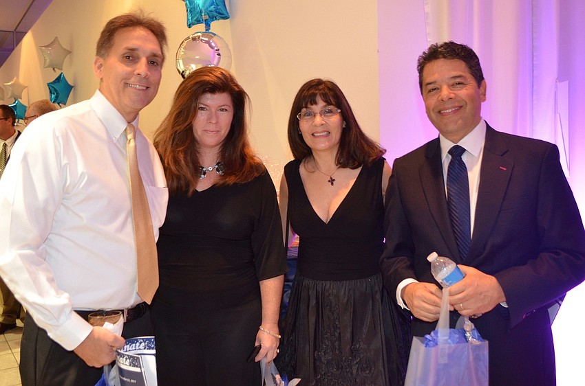 Troy and Joyce Sacco with David and Liliana Quintero